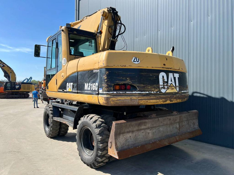 Cat M316C - מחפר גלגלים: תמונה 2 Cat M316C - מחפר גלגלים: תמונה 2