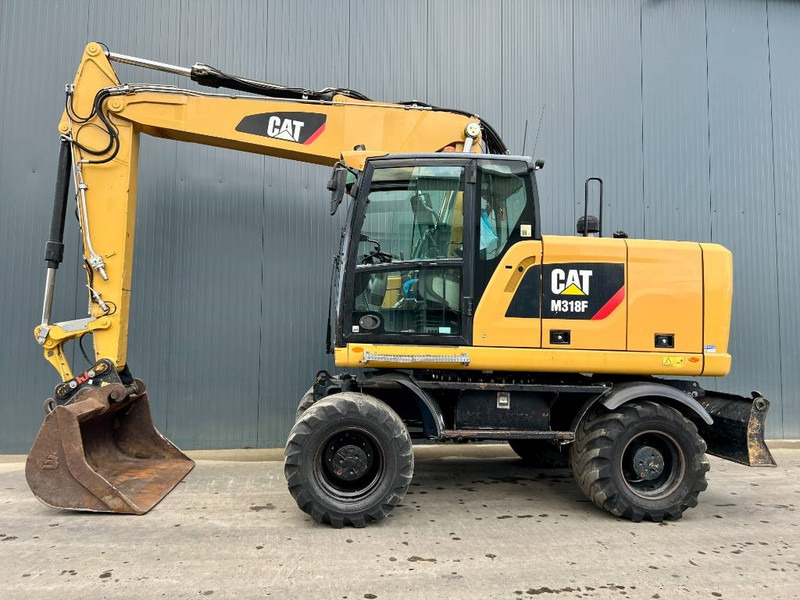 Cat M318F - מחפר גלגלים: תמונה 2 Cat M318F - מחפר גלגלים: תמונה 2