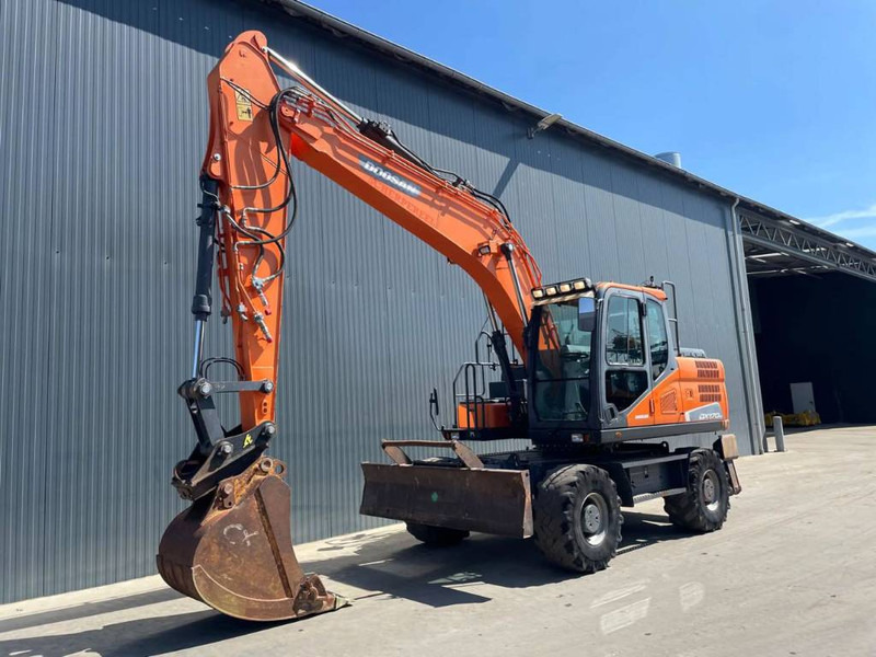 Doosan DX170W-5 - מחפר גלגלים: תמונה 1 Doosan DX170W-5 - מחפר גלגלים: תמונה 1