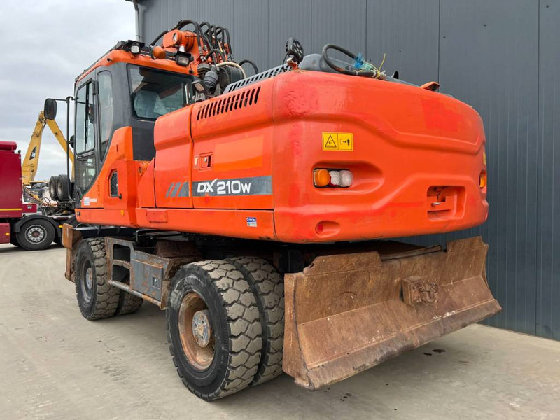 Doosan DX210W - מחפר גלגלים: תמונה 2 Doosan DX210W - מחפר גלגלים: תמונה 2
