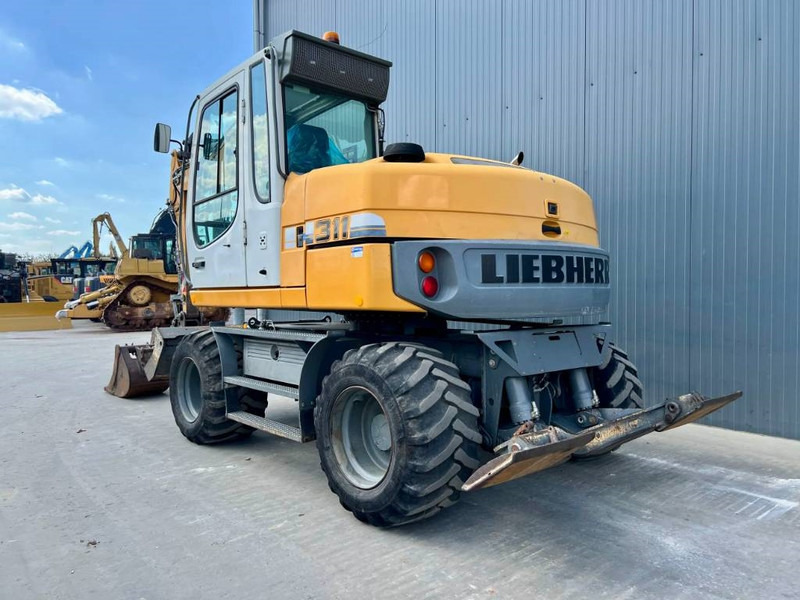 Liebherr A311 Litronic - מחפר גלגלים: תמונה 2 Liebherr A311 Litronic - מחפר גלגלים: תמונה 2