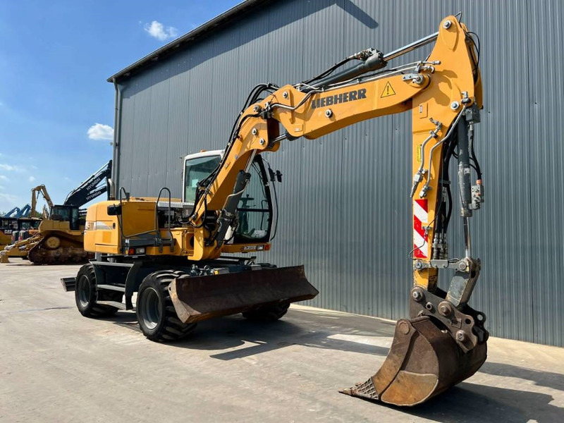 Liebherr A311 Litronic - מחפר גלגלים: תמונה 3 Liebherr A311 Litronic - מחפר גלגלים: תמונה 3