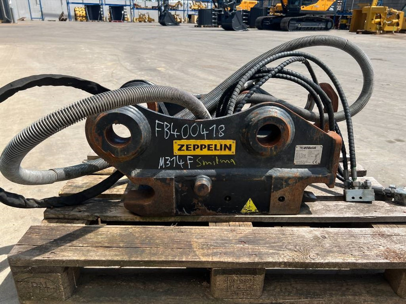 OilQuick OQ65 - M314F / M316F / M318F - מצמד מהיר עבור מכונת בנייה: תמונה 4 OilQuick OQ65 - M314F / M316F / M318F - מצמד מהיר עבור מכונת בנייה: תמונה 4