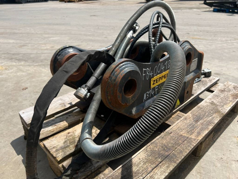 OilQuick OQ65 - M314F / M316F / M318F - מצמד מהיר עבור מכונת בנייה: תמונה 5 OilQuick OQ65 - M314F / M316F / M318F - מצמד מהיר עבור מכונת בנייה: תמונה 5