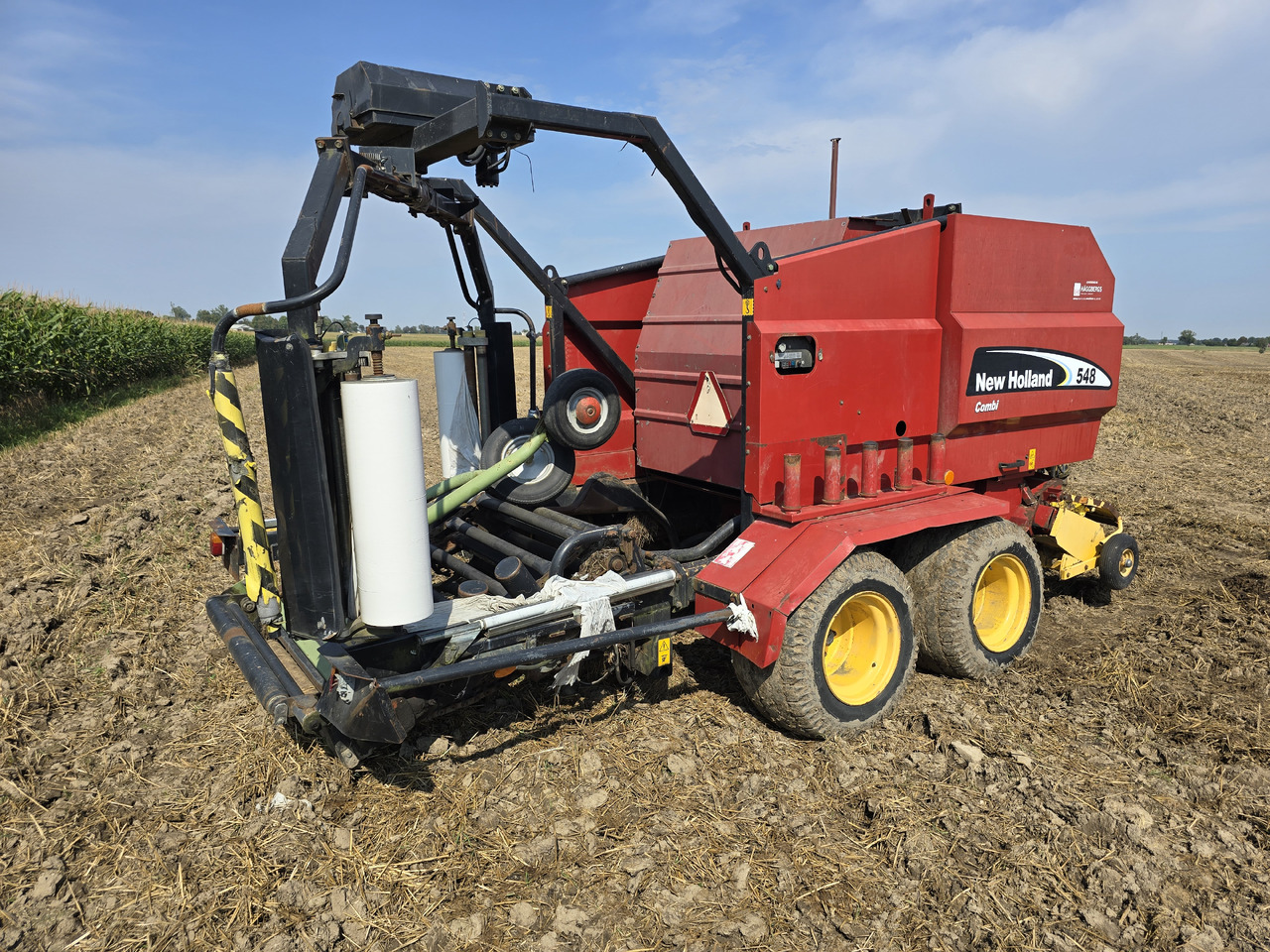 NEW HOLLAND 548 Combi - מכונת צרור עגולה: תמונה 3 NEW HOLLAND 548 Combi - מכונת צרור עגולה: תמונה 3