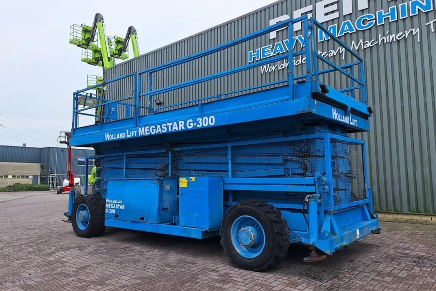 מעלית מספריים Holland Lift Megastar G300 Diesel, 4x4x4 Drive, 33.5m Working H: תמונה 8