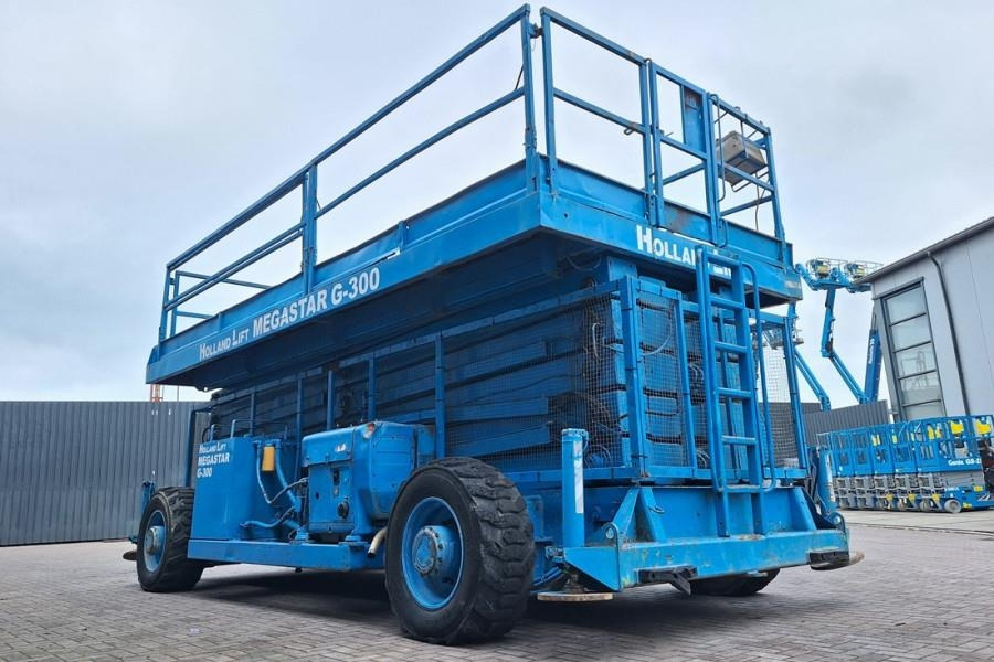 מעלית מספריים Holland Lift Megastar G300 Diesel, 4x4x4 Drive, 33.5m Working H: תמונה 7