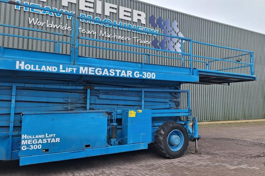 מעלית מספריים Holland Lift Megastar G300 Diesel, 4x4x4 Drive, 33.5m Working H: תמונה 9