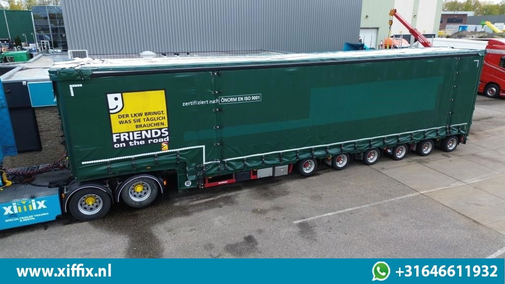 Meusburger 6-ass. Semi dieplader met elektische huifopbouw / 3x naloop gestuurd - סמיטריילר עם מטען נמוך: תמונה 1 Meusburger 6-ass. Semi dieplader met elektische huifopbouw / 3x naloop gestuurd - סמיטריילר עם מטען נמוך: תמונה 1