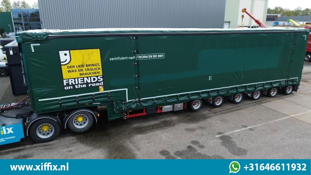 Meusburger 6-ass. Semi dieplader met elektrische huifopbouw / 3x naloop gestuurd - סמיטריילר עם מטען נמוך: תמונה 1 Meusburger 6-ass. Semi dieplader met elektrische huifopbouw / 3x naloop gestuurd - סמיטריילר עם מטען נמוך: תמונה 1