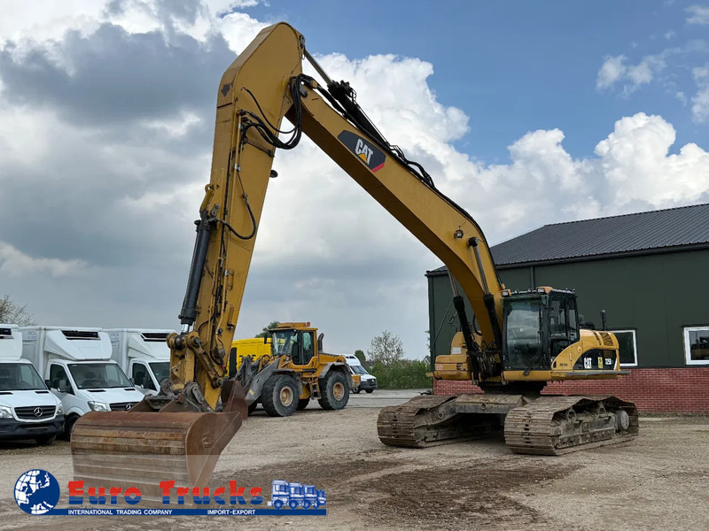 Caterpillar 325D long reach - מחפר סורק: תמונה 1 Caterpillar 325D long reach - מחפר סורק: תמונה 1