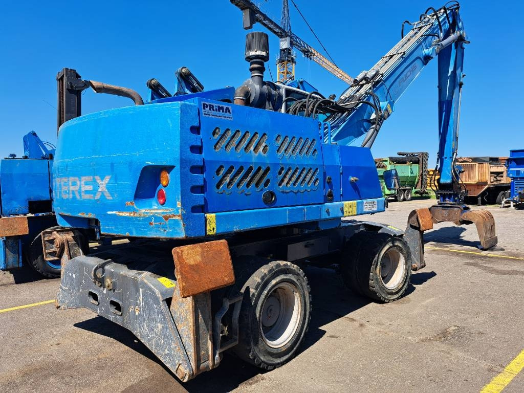 Fuchs MHL331E + Grapple - מטפל בפסולת/ תעשייתי: תמונה 1 Fuchs MHL331E + Grapple - מטפל בפסולת/ תעשייתי: תמונה 1