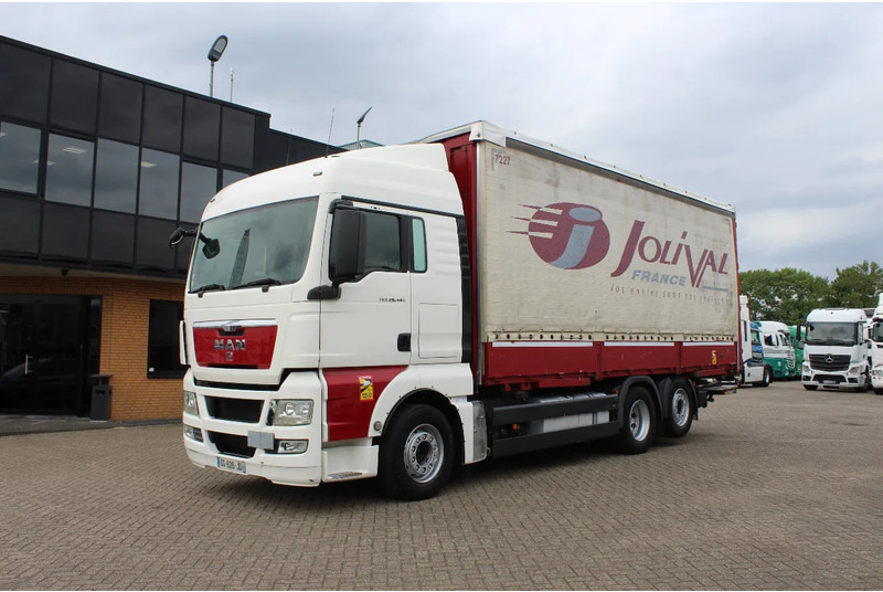 MAN TGX 26.440 * EURO5 * 6X2 * LIFT AXLE * - משאית וילונות צד: תמונה 1 MAN TGX 26.440 * EURO5 * 6X2 * LIFT AXLE * - משאית וילונות צד: תמונה 1