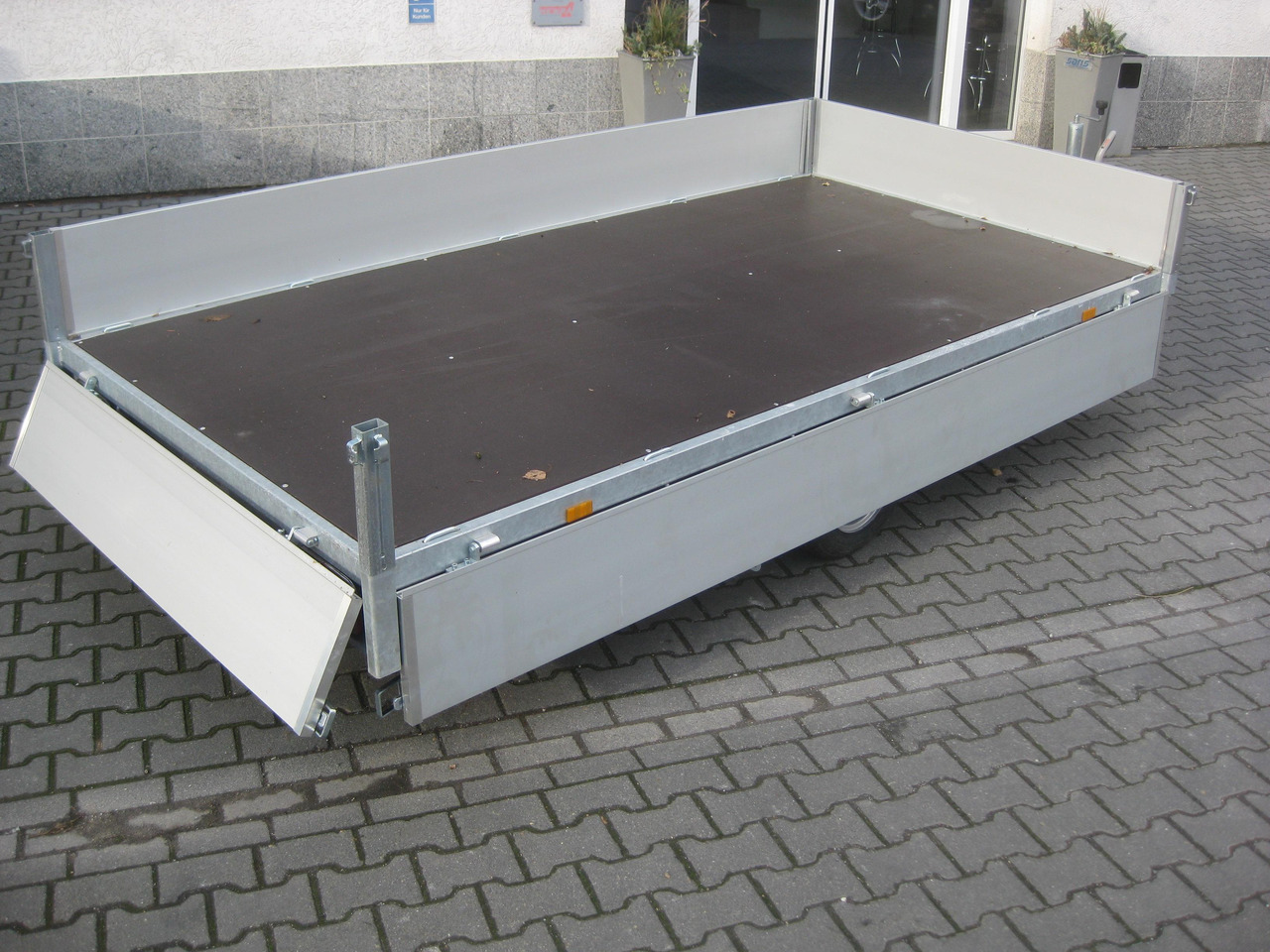 קרון נגרר למכונית Hochlader 310x160x30cm Lfh: 56cm 10" niedrig Fahrwerk (M) 1500kg: תמונה 8