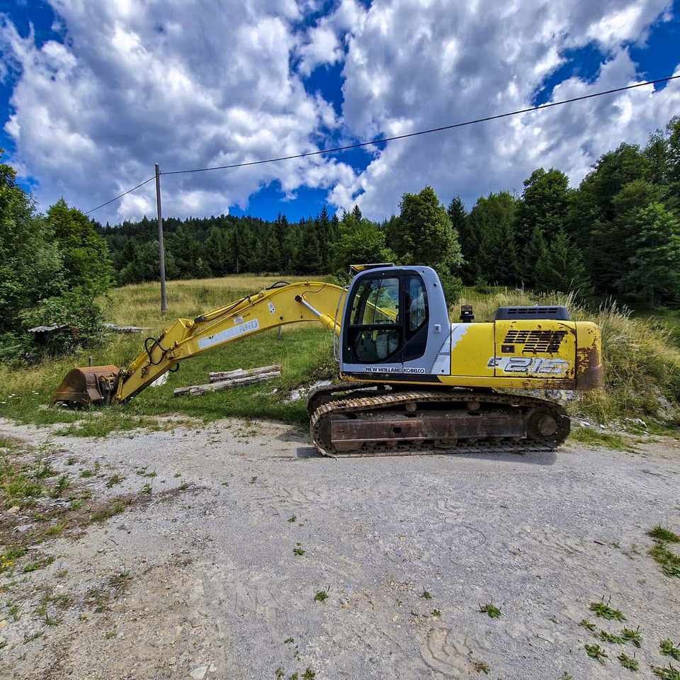 New Holland Kobelco E215 - מחפר סורק: תמונה 1 New Holland Kobelco E215 - מחפר סורק: תמונה 1