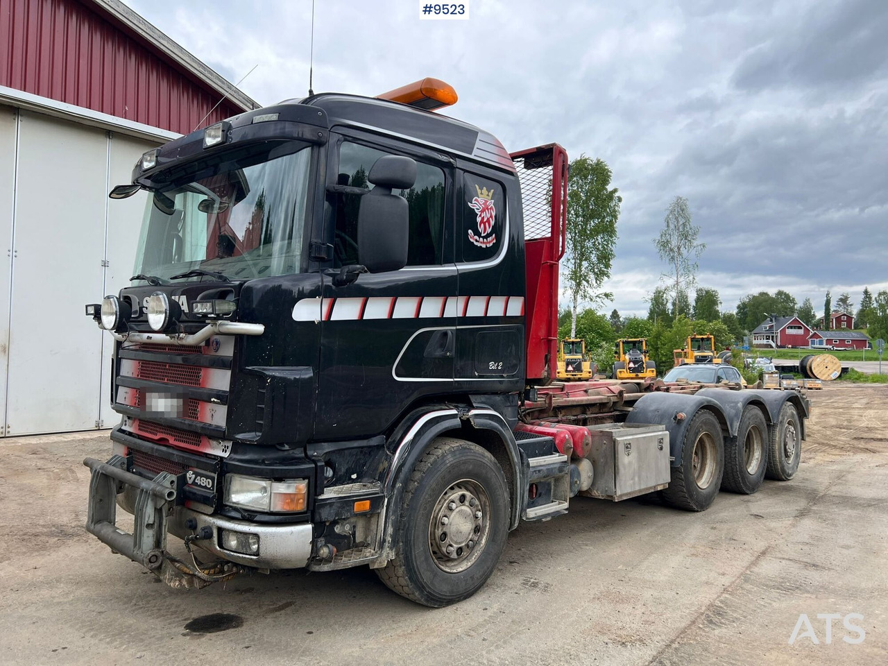 Scania R164 Tridem Hooklift - משאית הרמת וו: תמונה 1 Scania R164 Tridem Hooklift - משאית הרמת וו: תמונה 1