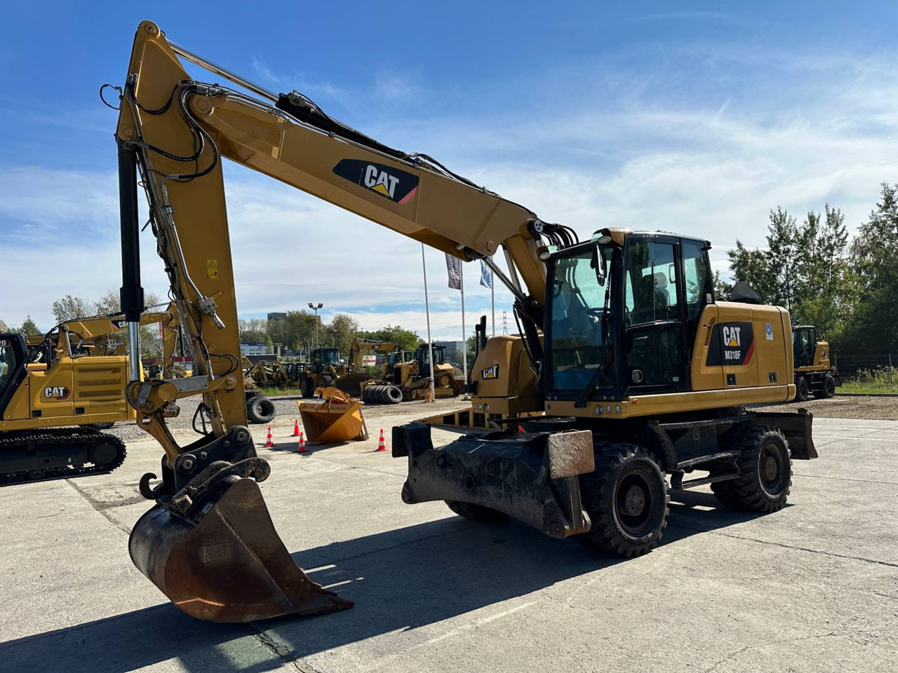 CAT M318F - מעמיס גלגלים: תמונה 1 CAT M318F - מעמיס גלגלים: תמונה 1