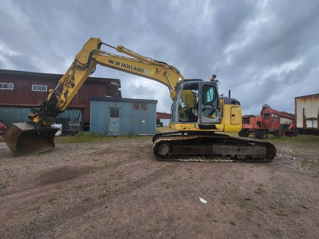 New Holland Kobelco E 235 B SR-2 - מחפר סורק: תמונה 2 New Holland Kobelco E 235 B SR-2 - מחפר סורק: תמונה 2