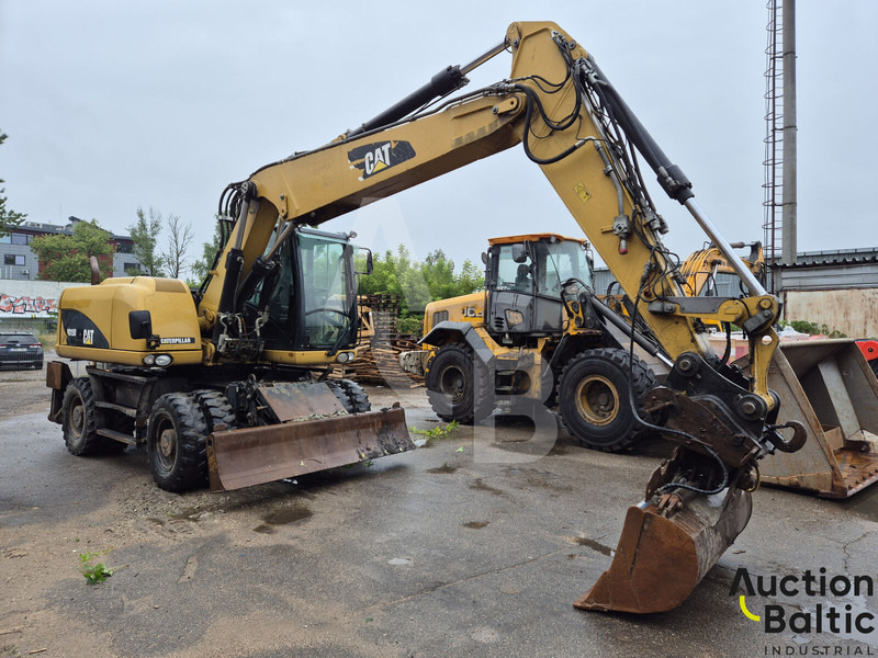 Caterpillar M 315 D - מחפר גלגלים: תמונה 2 Caterpillar M 315 D - מחפר גלגלים: תמונה 2