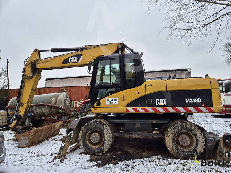 Caterpillar M 318 D - מחפר גלגלים: תמונה 1 Caterpillar M 318 D - מחפר גלגלים: תמונה 1