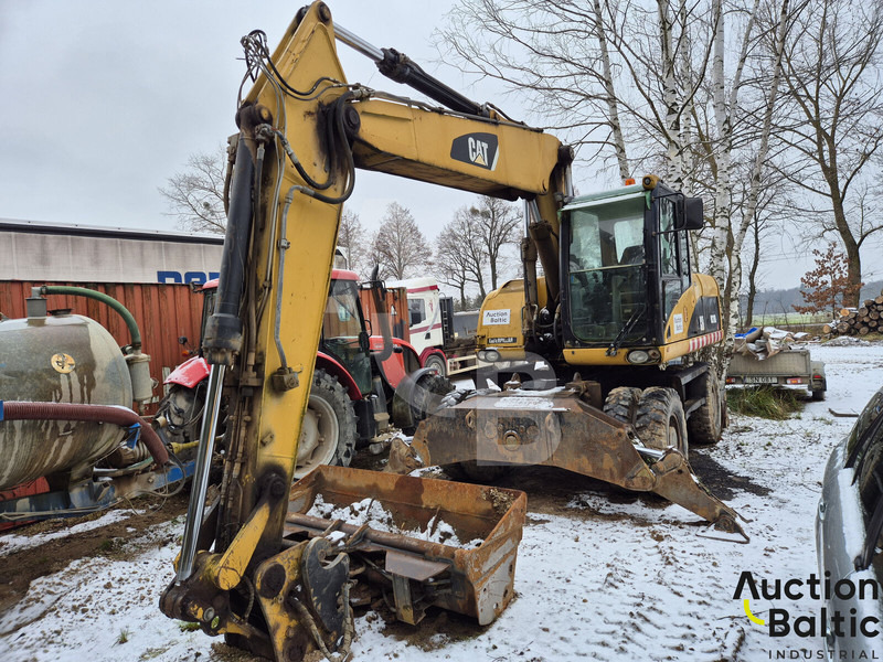 Caterpillar M 318 D - מחפר גלגלים: תמונה 2 Caterpillar M 318 D - מחפר גלגלים: תמונה 2
