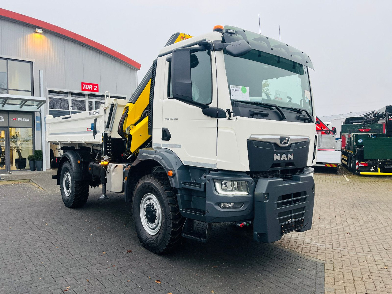 MAN TGM 18.320 4x4 BB Kipper Kran 131 Single Winter - משאית מנוף: תמונה 2 MAN TGM 18.320 4x4 BB Kipper Kran 131 Single Winter - משאית מנוף: תמונה 2