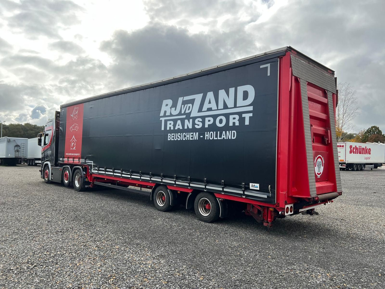 Meusburger 2-Achs-Gabelstaplertransporter Rampe Dhollandia - סמיטריילר עם מטען נמוך: תמונה 2 Meusburger 2-Achs-Gabelstaplertransporter Rampe Dhollandia - סמיטריילר עם מטען נמוך: תמונה 2