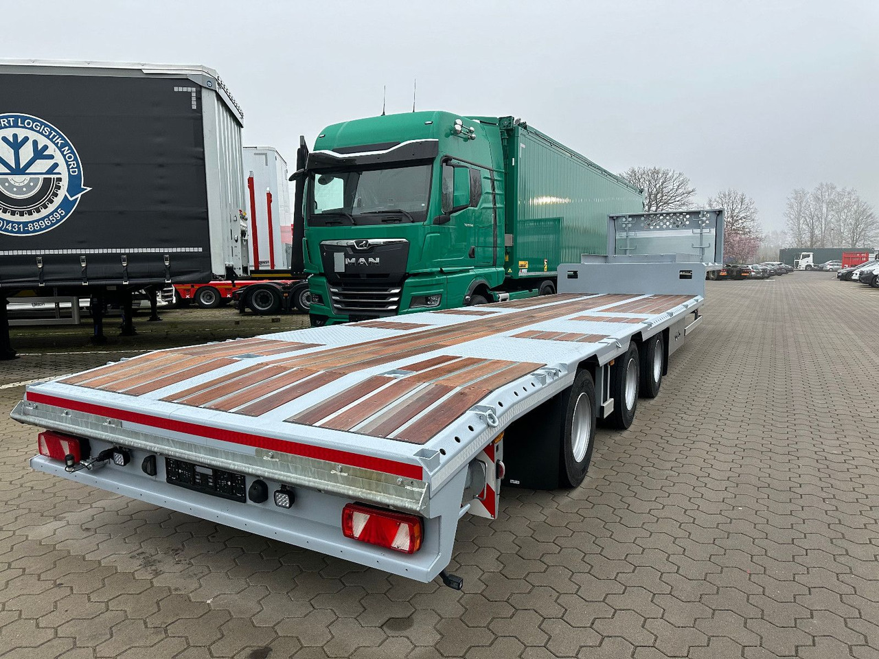 Tieflader Zwangslenkung Betonteile Fertigteile - סמיטריילר עם מטען נמוך: תמונה 4 Tieflader Zwangslenkung Betonteile Fertigteile - סמיטריילר עם מטען נמוך: תמונה 4