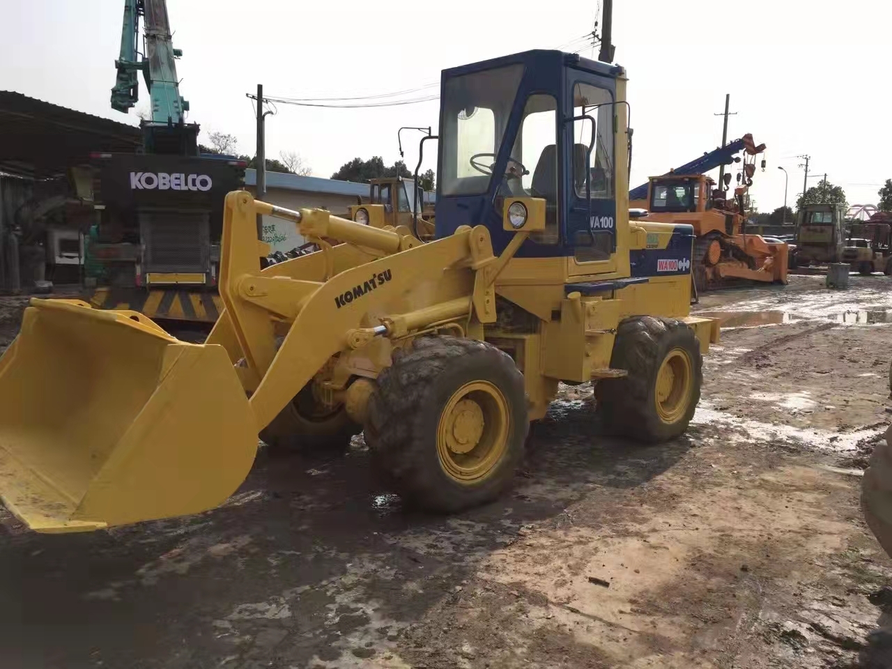 KOMATSU WA100 - מעמיס גלגלים: תמונה 2 KOMATSU WA100 - מעמיס גלגלים: תמונה 2