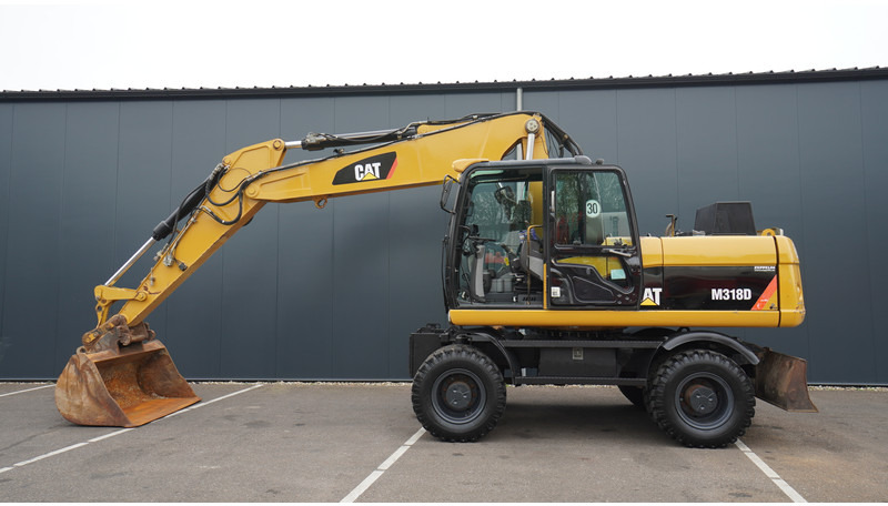 Caterpillar M318D 4X4 WHEELED EXCAVATOR - מכונת בנייה: תמונה 1 Caterpillar M318D 4X4 WHEELED EXCAVATOR - מכונת בנייה: תמונה 1