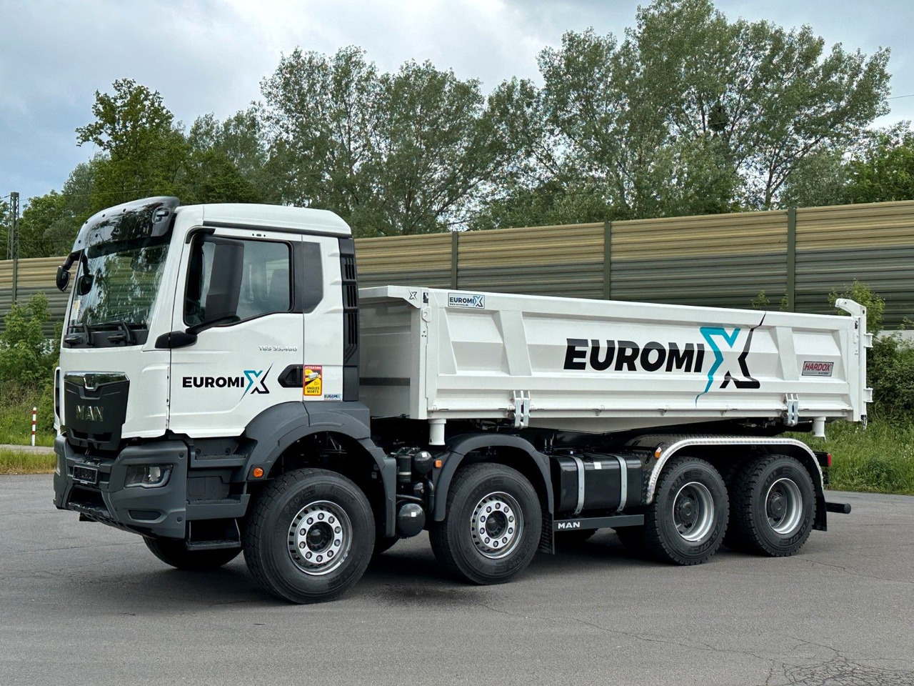 MAN TGS 35.480 8x4 EuromixMTP 2-Seiten-Kipper - מזהיר: תמונה 1 MAN TGS 35.480 8x4 EuromixMTP 2-Seiten-Kipper - מזהיר: תמונה 1