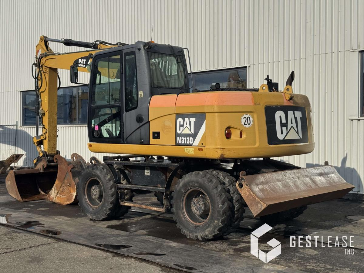 Caterpillar M313D - מחפר גלגלים: תמונה 2 Caterpillar M313D - מחפר גלגלים: תמונה 2