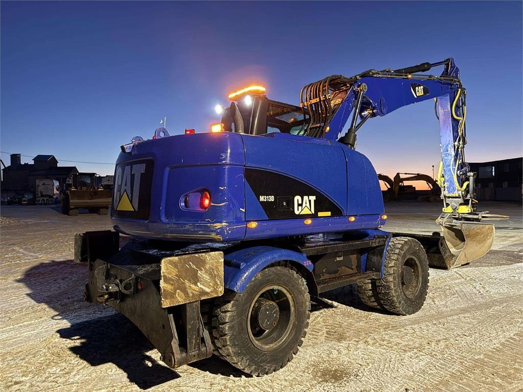 CAT M 313 D Rototilt + Grapple - מחפר גלגלים: תמונה 3 CAT M 313 D Rototilt + Grapple - מחפר גלגלים: תמונה 3