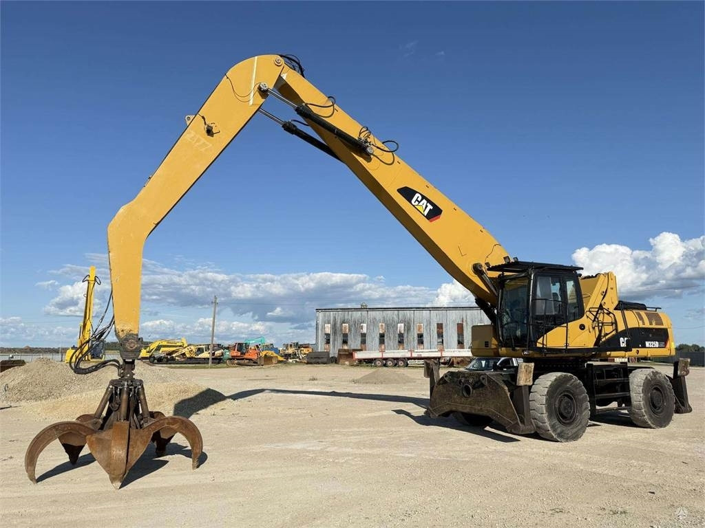 CAT M 325 DLMH - מחפר גלגלים: תמונה 1 CAT M 325 DLMH - מחפר גלגלים: תמונה 1