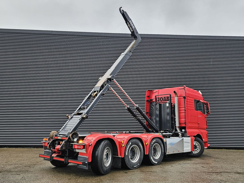 MAN TGX 35.500 / 8x4-4 / HOOKLIFT / ABROLL-KIPPER - משאית הרמת וו: תמונה 4 MAN TGX 35.500 / 8x4-4 / HOOKLIFT / ABROLL-KIPPER - משאית הרמת וו: תמונה 4