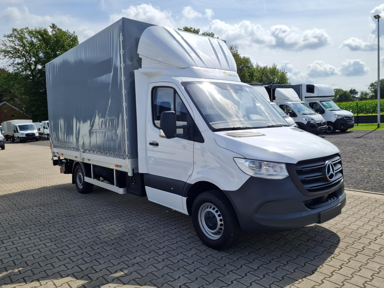 Mercedes-Benz Sprinter 315 / 317 Pritsche Schiebe Plane LBW KLIMA - כלי רכב מסחרי עם וילונות צד: תמונה 4 Mercedes-Benz Sprinter 315 / 317 Pritsche Schiebe Plane LBW KLIMA - כלי רכב מסחרי עם וילונות צד: תמונה 4