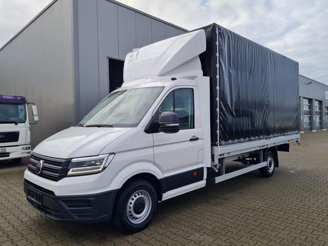 Volkswagen Crafter 35 Pritsche TDI Schiebe Plane L4 - כלי רכב מסחרי עם וילונות צד: תמונה 3 Volkswagen Crafter 35 Pritsche TDI Schiebe Plane L4 - כלי רכב מסחרי עם וילונות צד: תמונה 3