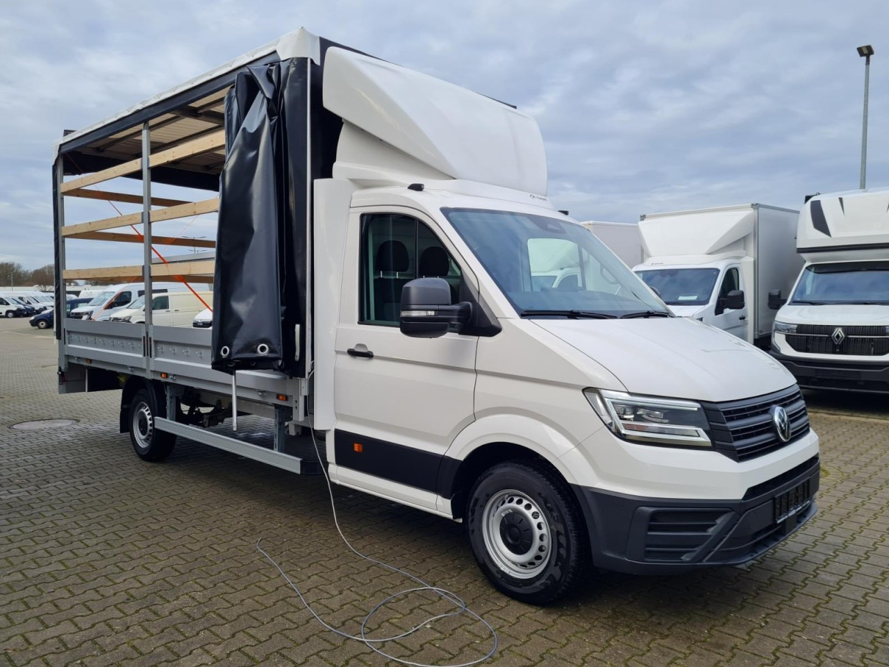 Volkswagen Crafter 35 Pritsche TDI Schiebe Plane L4 - כלי רכב מסחרי עם וילונות צד: תמונה 4 Volkswagen Crafter 35 Pritsche TDI Schiebe Plane L4 - כלי רכב מסחרי עם וילונות צד: תמונה 4