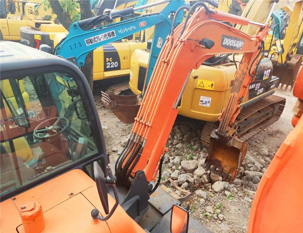 Doosan DX60 W - מחפר גלגלים: תמונה 3 Doosan DX60 W - מחפר גלגלים: תמונה 3