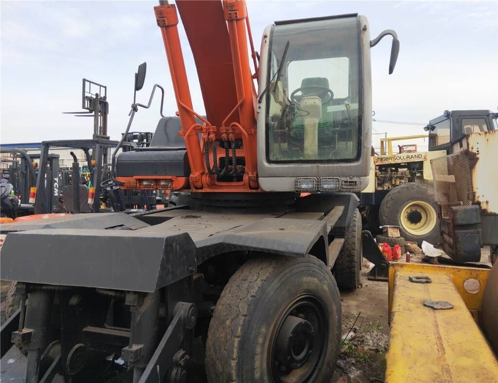 Hitachi ZX160WD - מחפר גלגלים: תמונה 1 Hitachi ZX160WD - מחפר גלגלים: תמונה 1