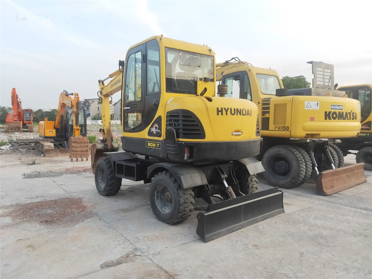Hyundai R60W-7 - מחפר גלגלים: תמונה 2 Hyundai R60W-7 - מחפר גלגלים: תמונה 2