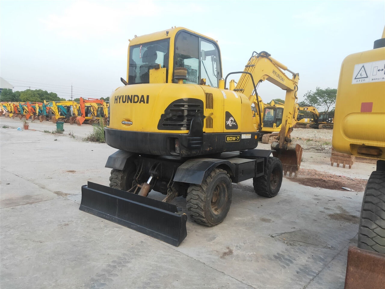 Hyundai R60W-7 - מחפר גלגלים: תמונה 1 Hyundai R60W-7 - מחפר גלגלים: תמונה 1