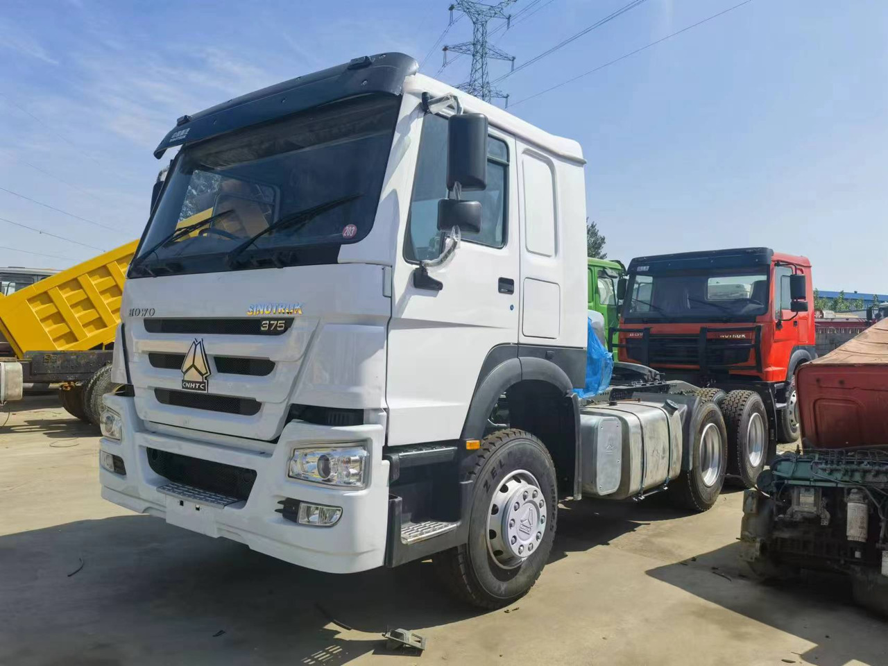 Sinotruk HOWO 375 tractor - מיני מסיר פסולת: תמונה 1 Sinotruk HOWO 375 tractor - מיני מסיר פסולת: תמונה 1