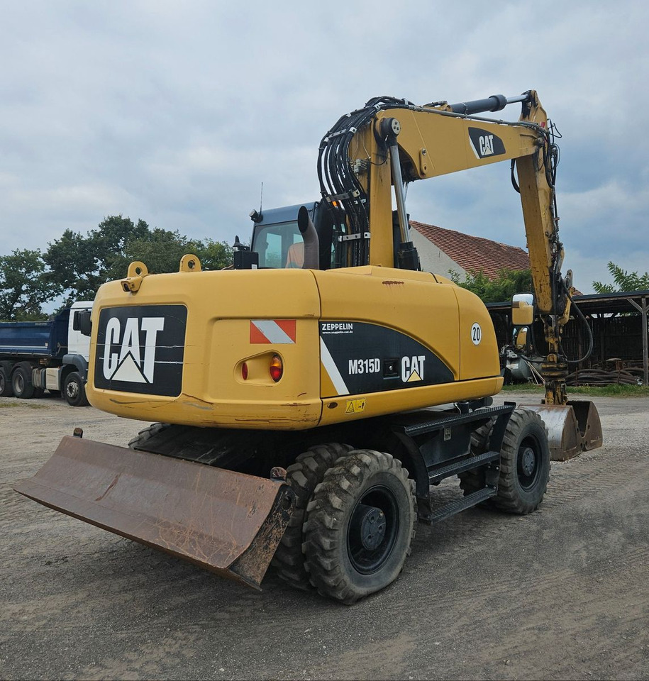 CAT M315D orig. 4.129h - מחפר גלגלים: תמונה 2 CAT M315D orig. 4.129h - מחפר גלגלים: תמונה 2
