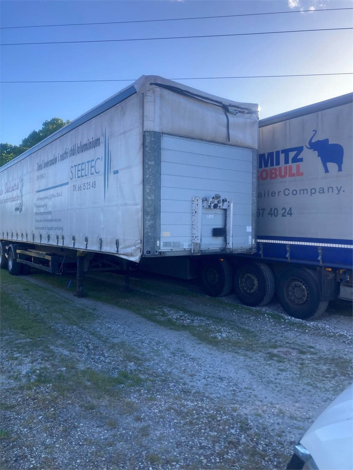 Schmitz 13,6 mtr gardin - lift - סמיטריילר עם וילונות צד: תמונה 1 Schmitz 13,6 mtr gardin - lift - סמיטריילר עם וילונות צד: תמונה 1