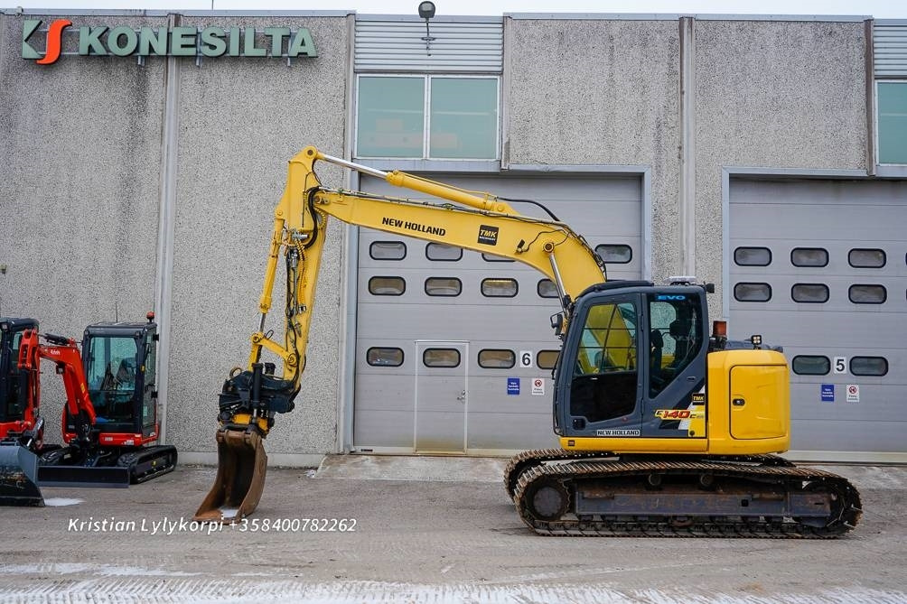 New Holland E140CSR PYÖRITTÄJÄLLÄ - מחפר סורק: תמונה 1 New Holland E140CSR PYÖRITTÄJÄLLÄ - מחפר סורק: תמונה 1