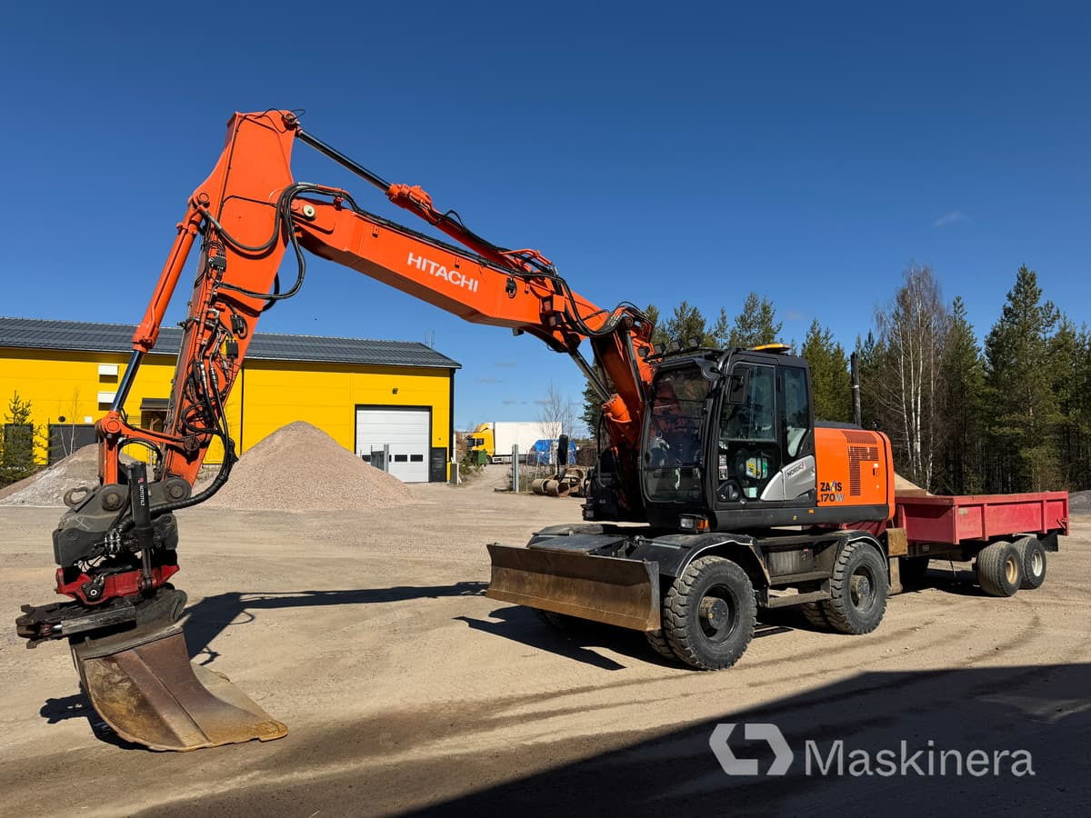Hitachi ZX170W-5B Hjulgrävare Hitachi ZX170W med vagn - מחפר סורק: תמונה 1 Hitachi ZX170W-5B Hjulgrävare Hitachi ZX170W med vagn - מחפר סורק: תמונה 1