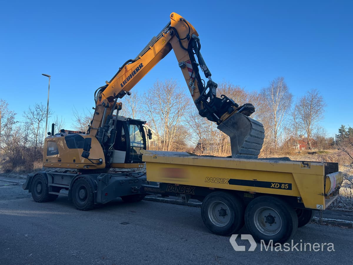 Hjulgrävare Liebherr 918 Compact Litronic med kärra - מחפר סורק: תמונה 1 Hjulgrävare Liebherr 918 Compact Litronic med kärra - מחפר סורק: תמונה 1