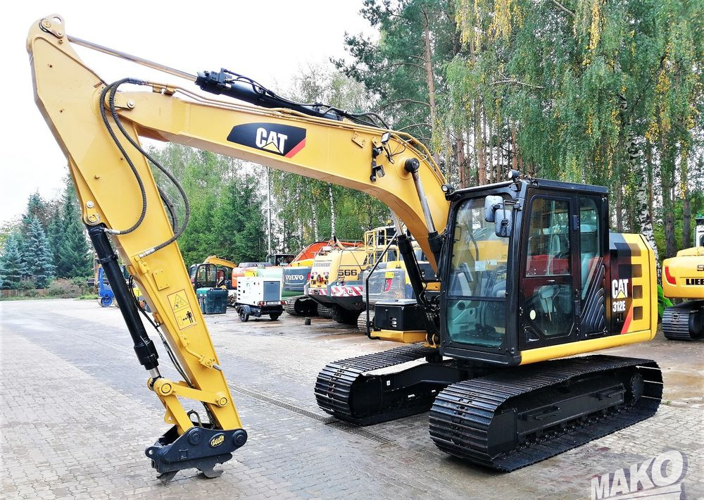 Caterpillar 312E - מחפר סורק: תמונה 1 Caterpillar 312E - מחפר סורק: תמונה 1