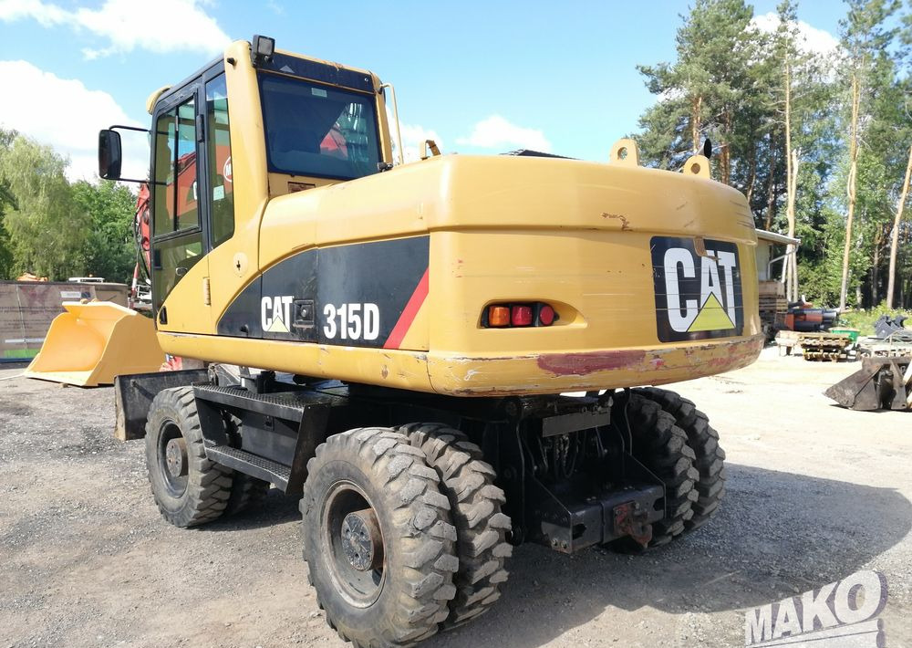 Caterpillar M315 C - מחפר גלגלים: תמונה 3 Caterpillar M315 C - מחפר גלגלים: תמונה 3